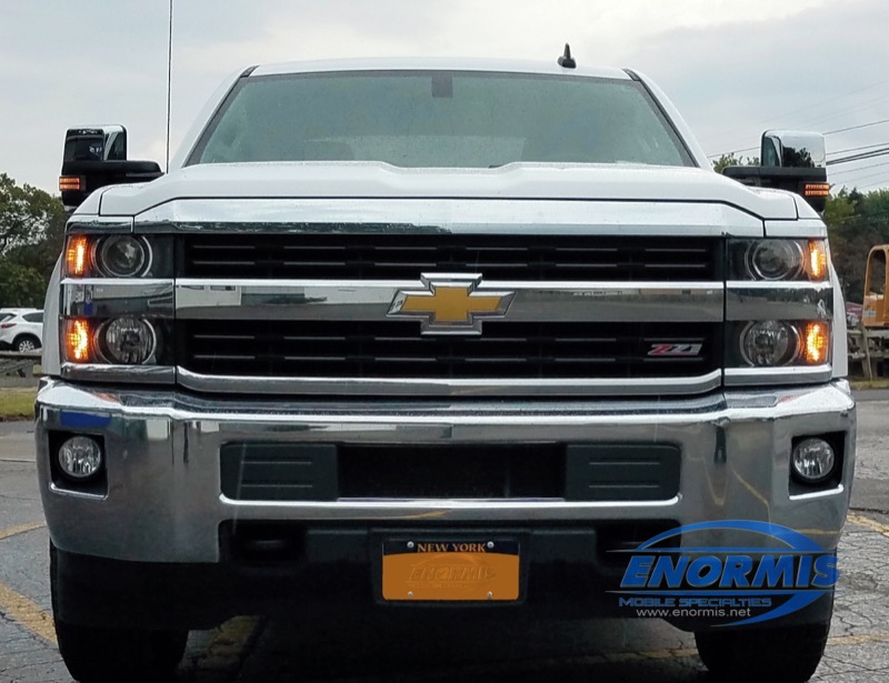 Chevy 2500 Tow Mirrors are added with Power Fold and Work lights